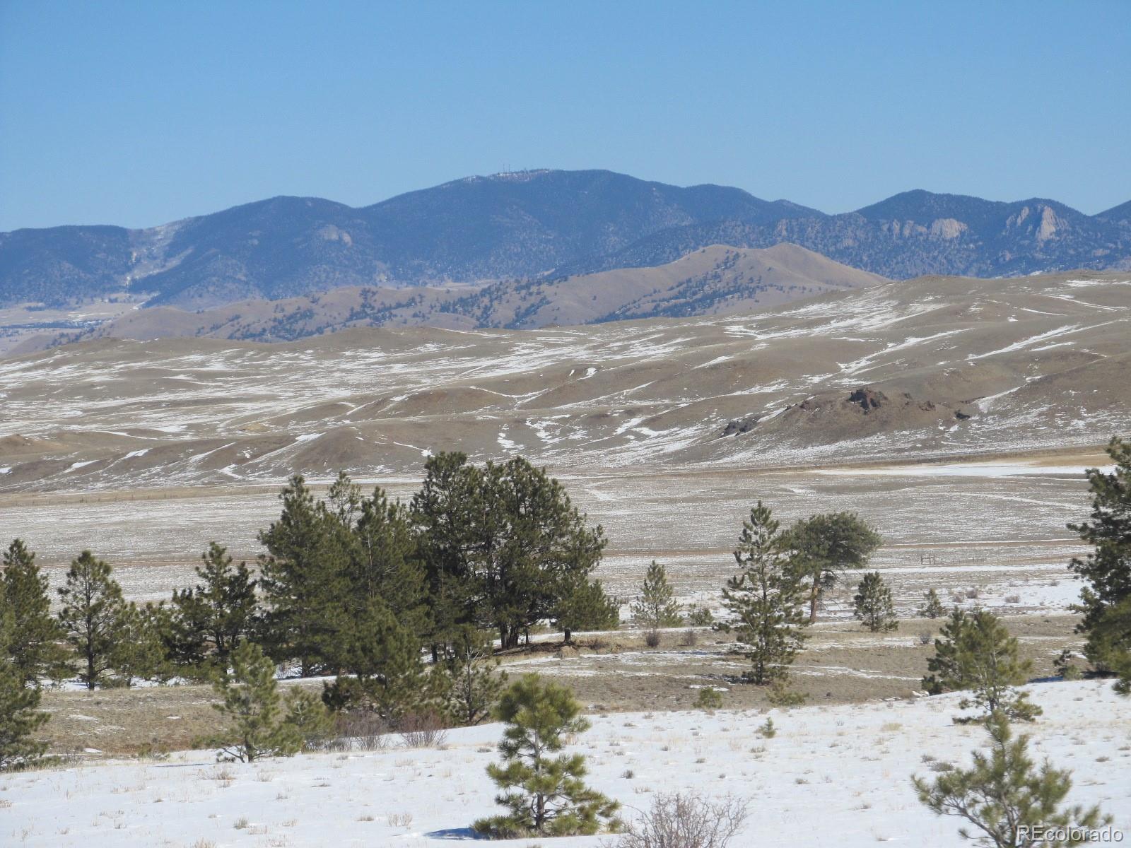 237 Black Beaver Road Hartsel, CO 80449 - Photo 3 of 7 a view of a town with mountains in the background