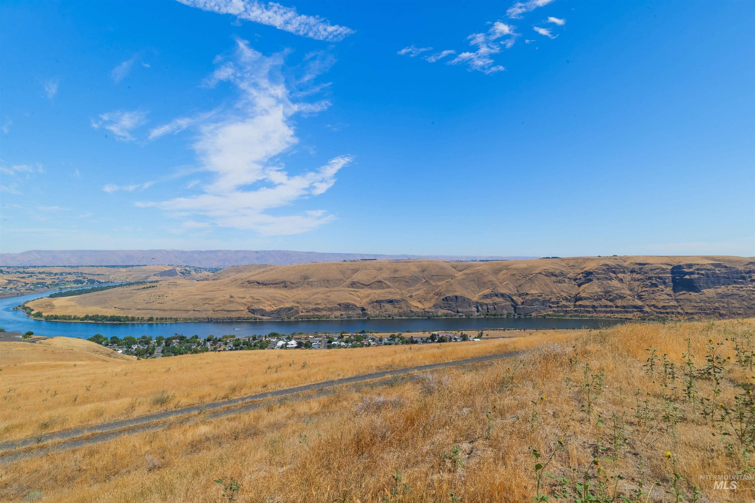 1550 Perro Pointe Road Asotin, WA 99402 - Photo 1 of 50 Water view featuring mountains