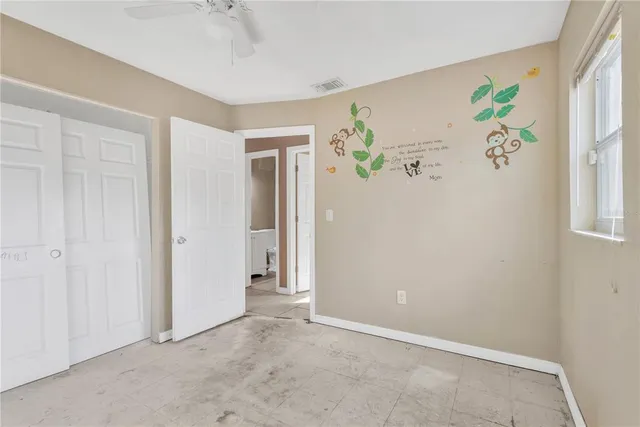 an empty room with windows