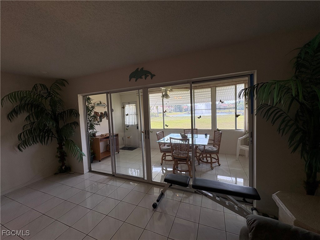 1830 Brantley Road, Unit J1 Fort Myers, FL 33907 - Photo 18 of 39 a room with furniture and a potted plant