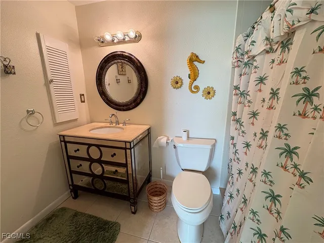 a bathroom with a toilet and a sink