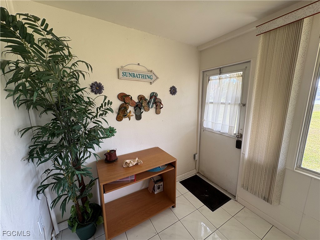 1830 Brantley Road, Unit J1 Fort Myers, FL 33907 - Photo 24 of 39 a view of workspace with furniture and window