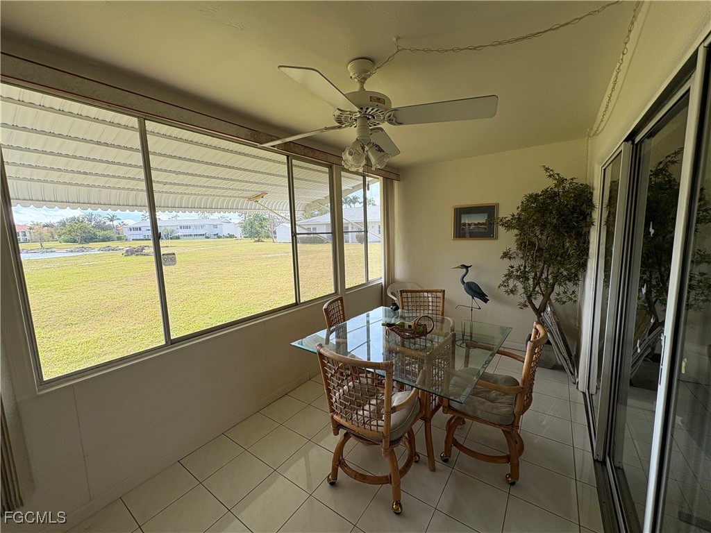 1830 Brantley Road, Unit J1 Fort Myers, FL 33907 - Photo 25 of 39 a dining room with furniture and window