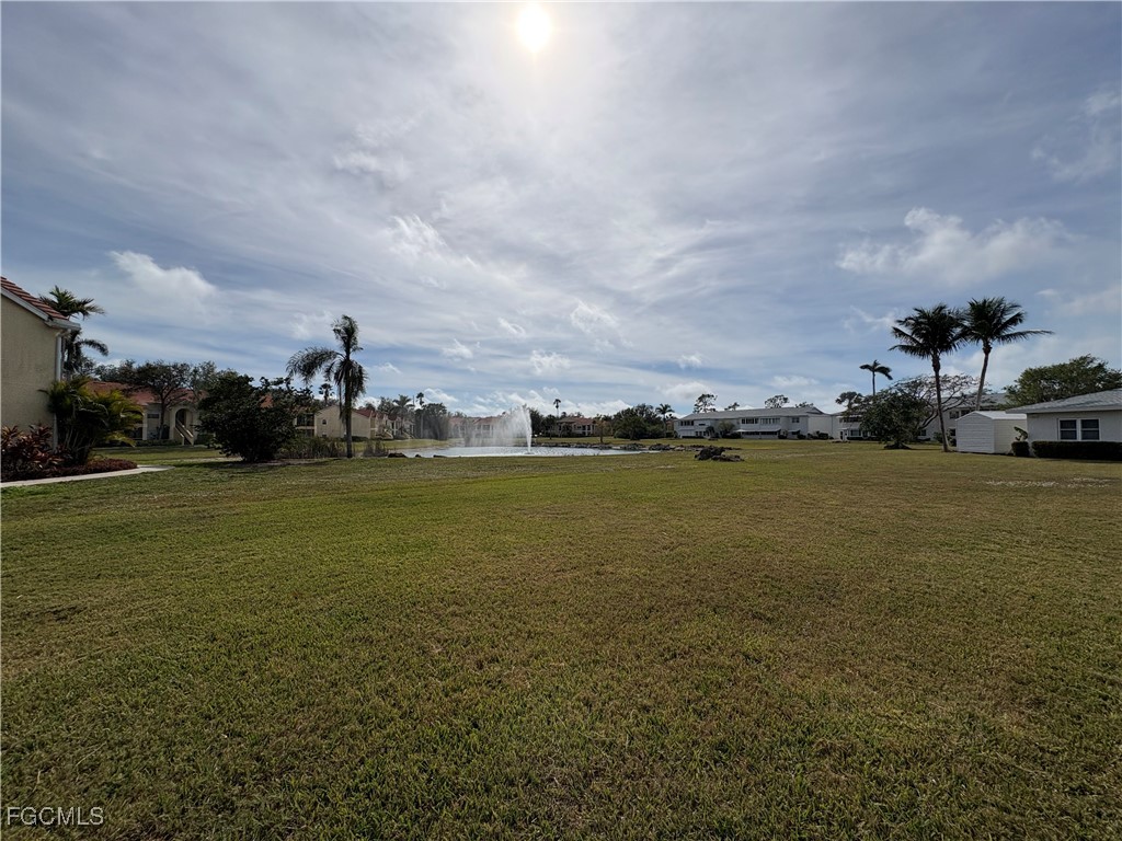 1830 Brantley Road, Unit J1 Fort Myers, FL 33907 - Photo 29 of 39 a view of building with ocean view
