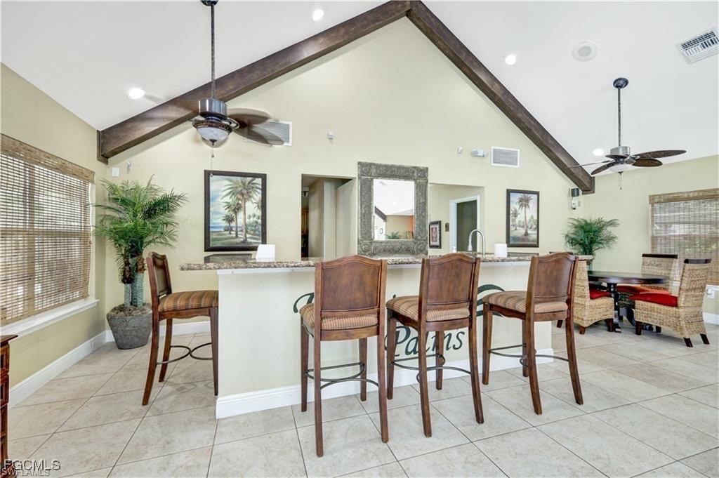 1830 Brantley Road, Unit J1 Fort Myers, FL 33907 - Photo 35 of 39 a dining room with furniture and window