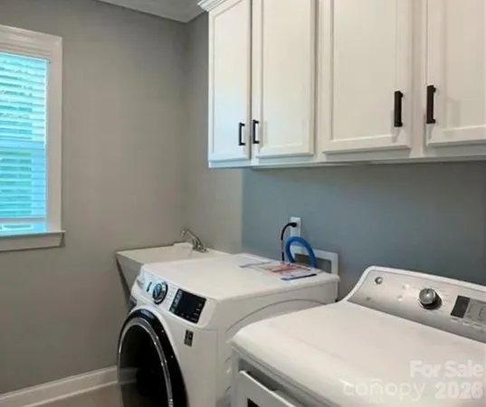 a view of a swimming pool with an outdoor space and seating area
