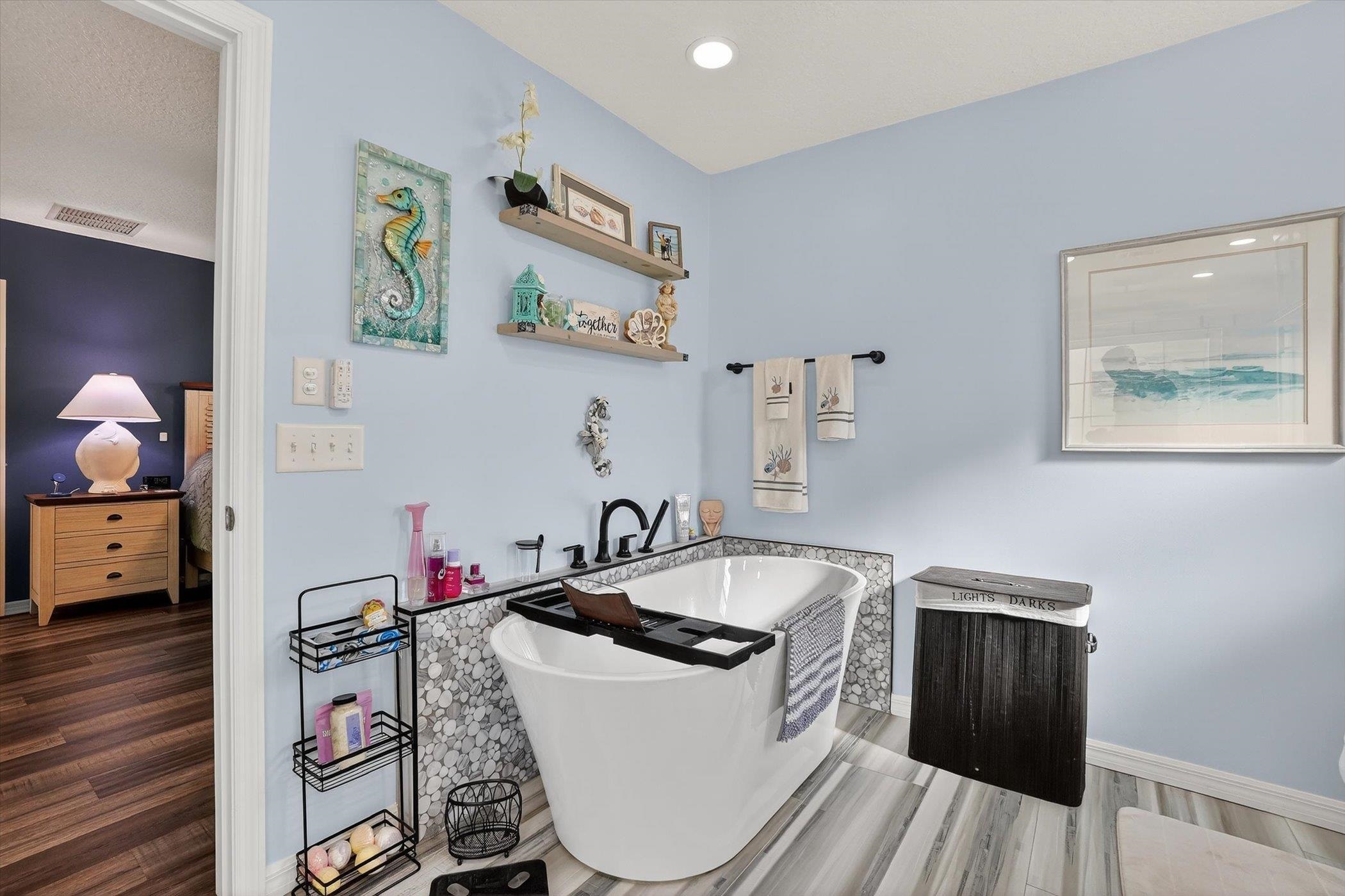 229 Yale Road St. Augustine, FL 32086 - Photo 19 of 47 Laundry area featuring wood finished floors