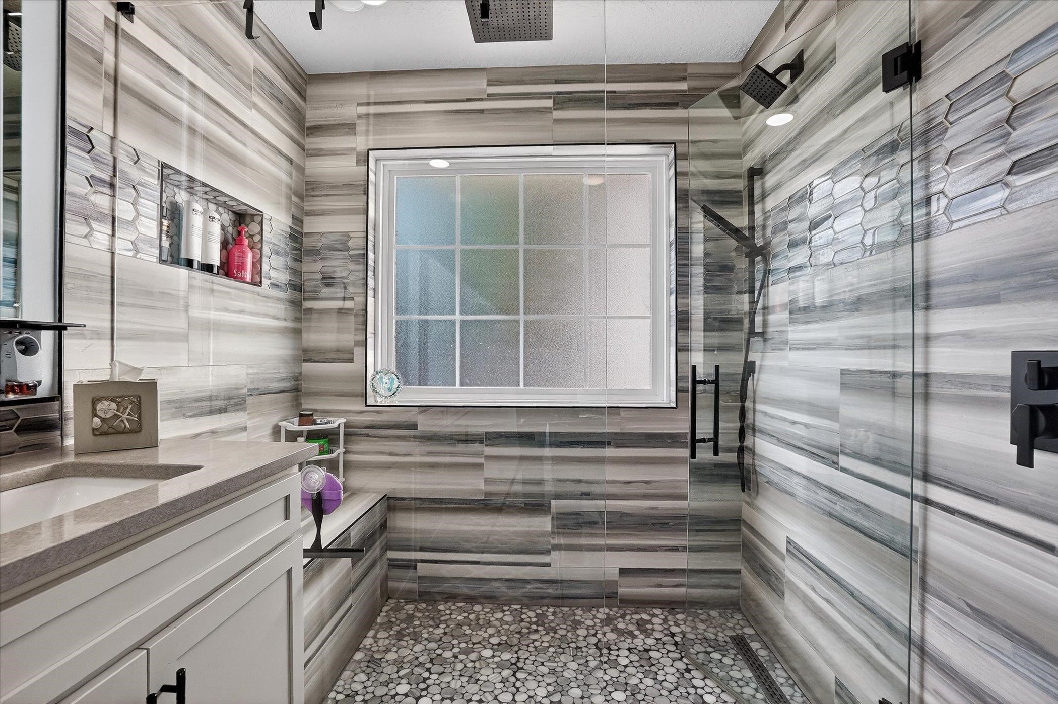 229 Yale Road St. Augustine, FL 32086 - Photo 20 of 47 Bathroom featuring vanity and a shower stall