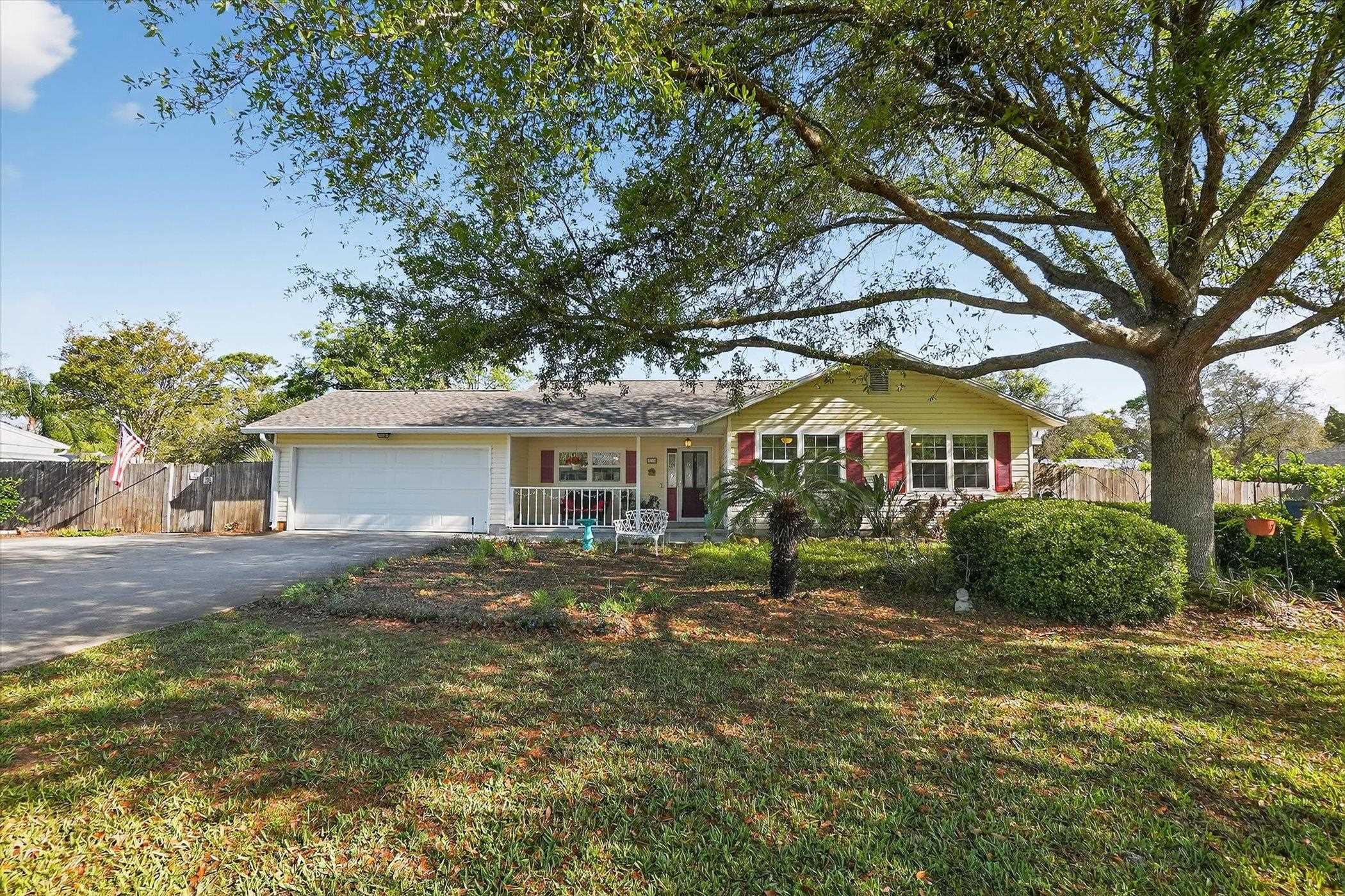 229 Yale Road St. Augustine, FL 32086 - Photo 26 of 47 Ranch-style home featuring an attached garage, driveway, and a porch