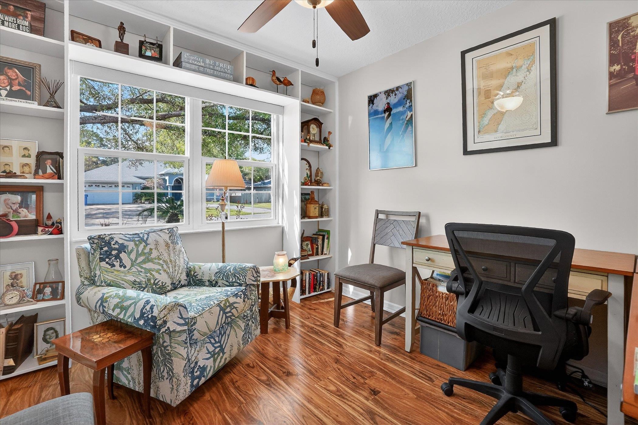 229 Yale Road St. Augustine, FL 32086 - Photo 34 of 47 Office space featuring built in features, a ceiling fan, and wood finished floors