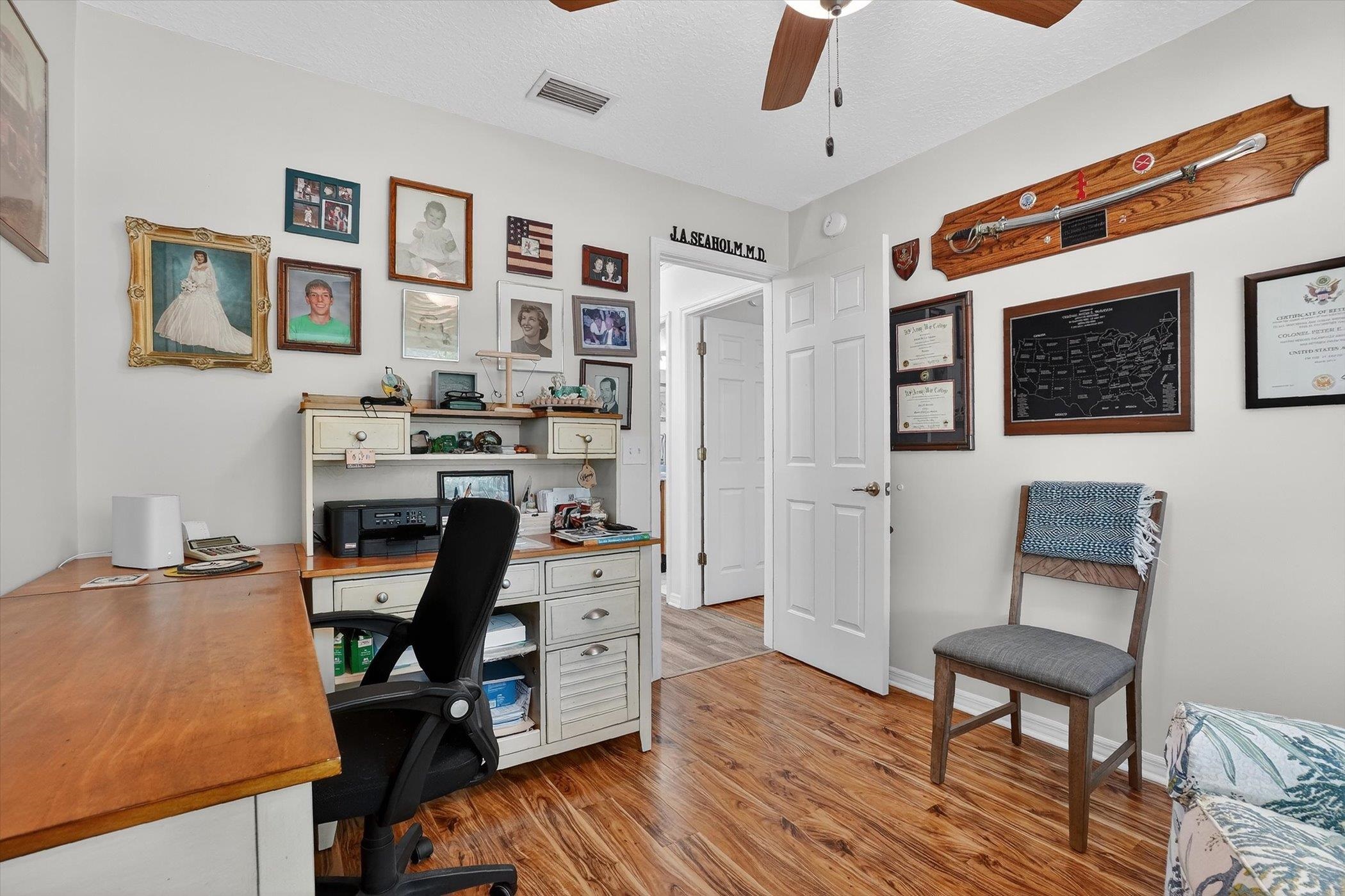 229 Yale Road St. Augustine, FL 32086 - Photo 35 of 47 Office area featuring a ceiling fan, a textured ceiling, and light wood-style flooring