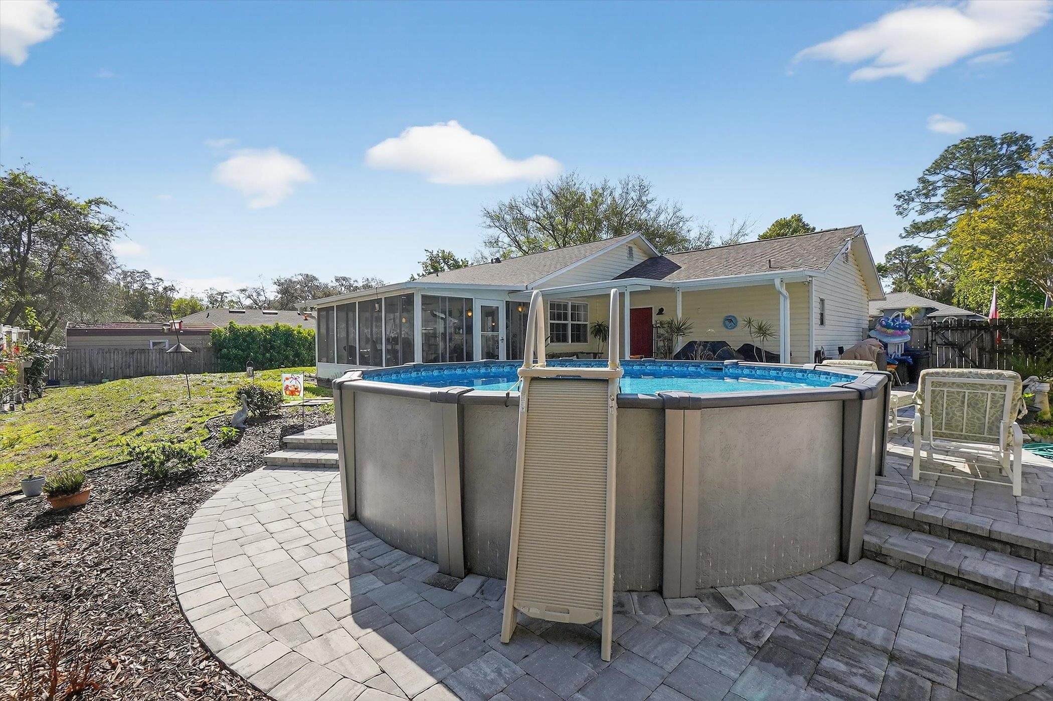 229 Yale Road St. Augustine, FL 32086 - Photo 41 of 47 View of pool featuring patio surround and a sunroom