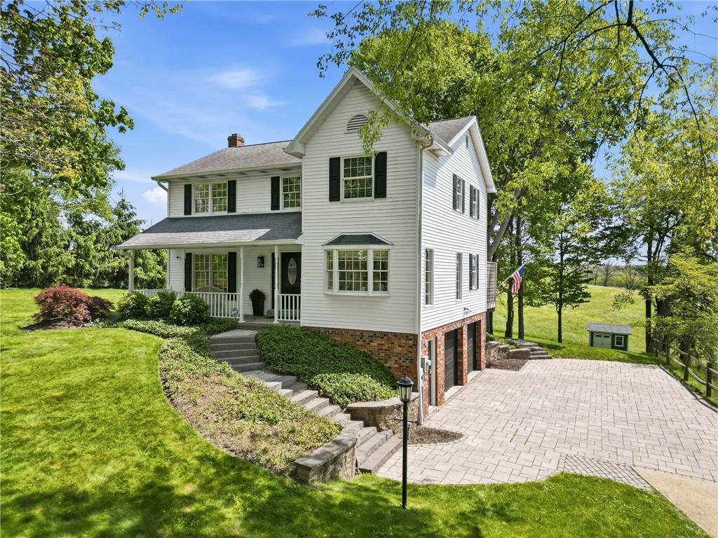 267 Forsythe Road Mars, PA 16046 - Photo 1 of 41 a front view of a house with a yard and porch
