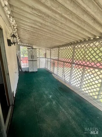 a view of a backyard of the house