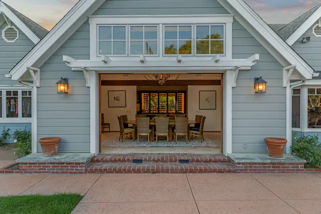 a view of a swimming pool with a yard