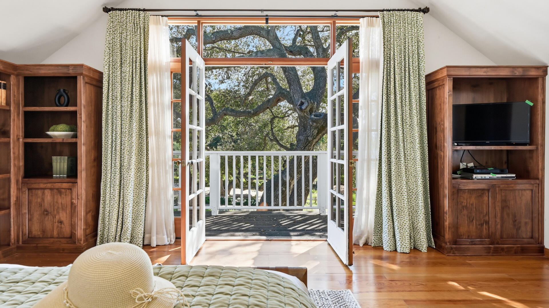 1642 Alamo Pintado Road Solvang, CA 93463 - Photo 30 of 85 a bedroom with a bed and a window