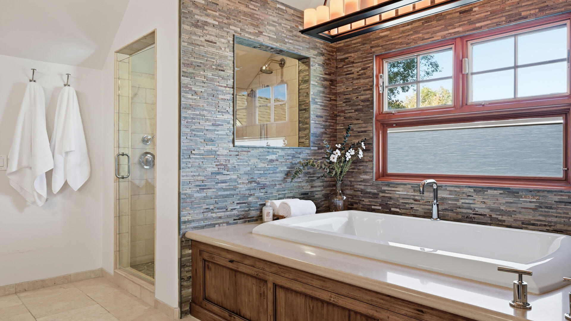 1642 Alamo Pintado Road Solvang, CA 93463 - Photo 36 of 85 a bathroom with a granite countertop sink a mirror and a bathtub