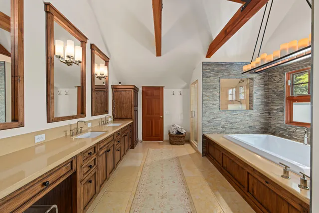 a living room with furniture flat screen tv and a fireplace