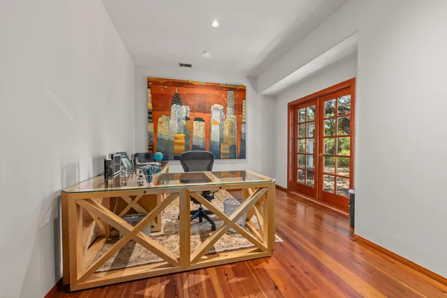 a bedroom with furniture and a window