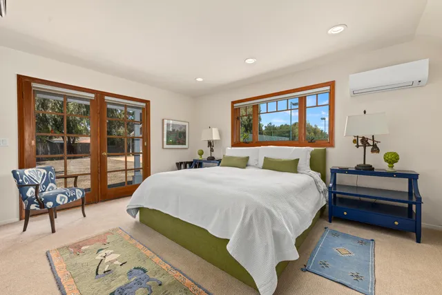 a view of a lake with a house in the background