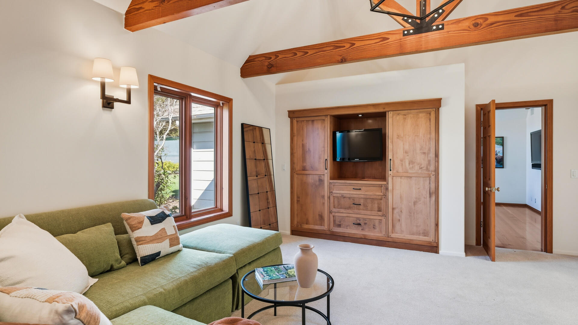 1642 Alamo Pintado Road Solvang, CA 93463 - Photo 46 of 85 a living room with furniture and large windows