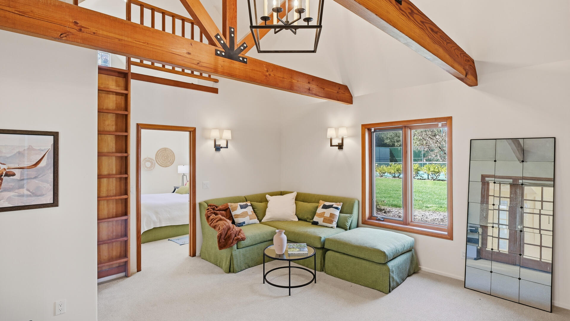 1642 Alamo Pintado Road Solvang, CA 93463 - Photo 47 of 85 a living room with furniture a ceiling fan and a window