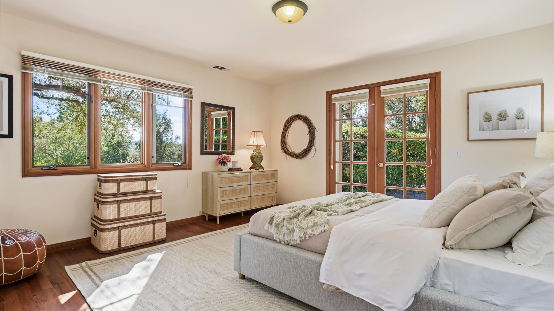 1642 Alamo Pintado Road Solvang, CA 93463 - Photo 48 of 85 a bedroom with a bed and a large window with the outer view