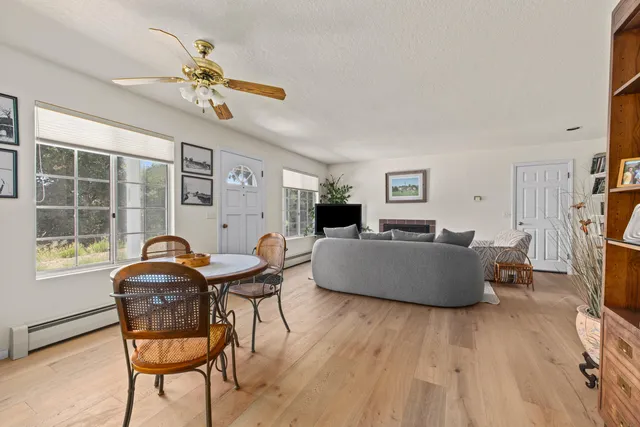 an aerial view of a house with a yard and garden