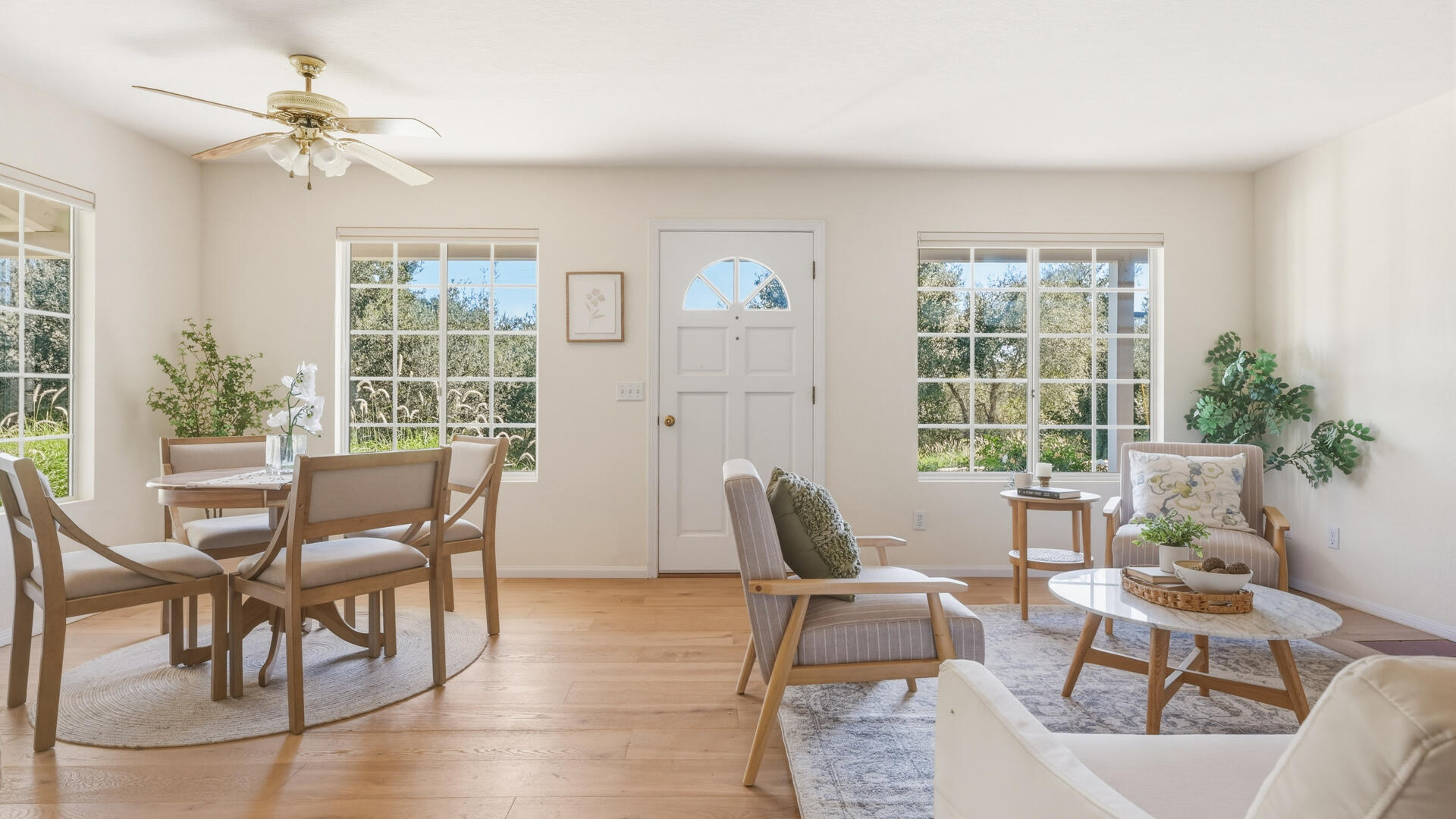 1642 Alamo Pintado Road Solvang, CA 93463 - Photo 61 of 85 a dining room with furniture a chandelier and wooden floor