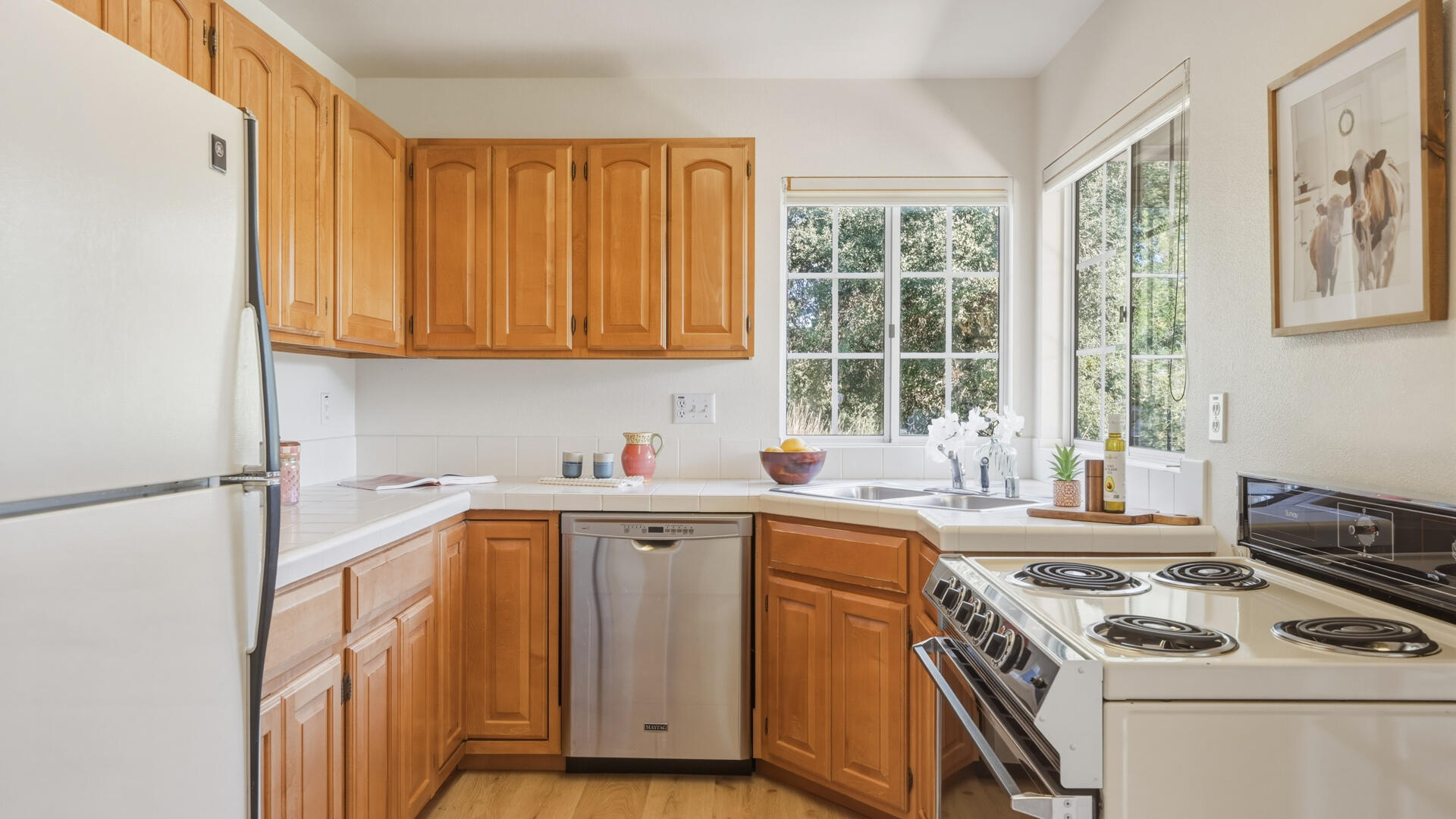 1642 Alamo Pintado Road Solvang, CA 93463 - Photo 63 of 85 a kitchen with a stove a sink and a microwave