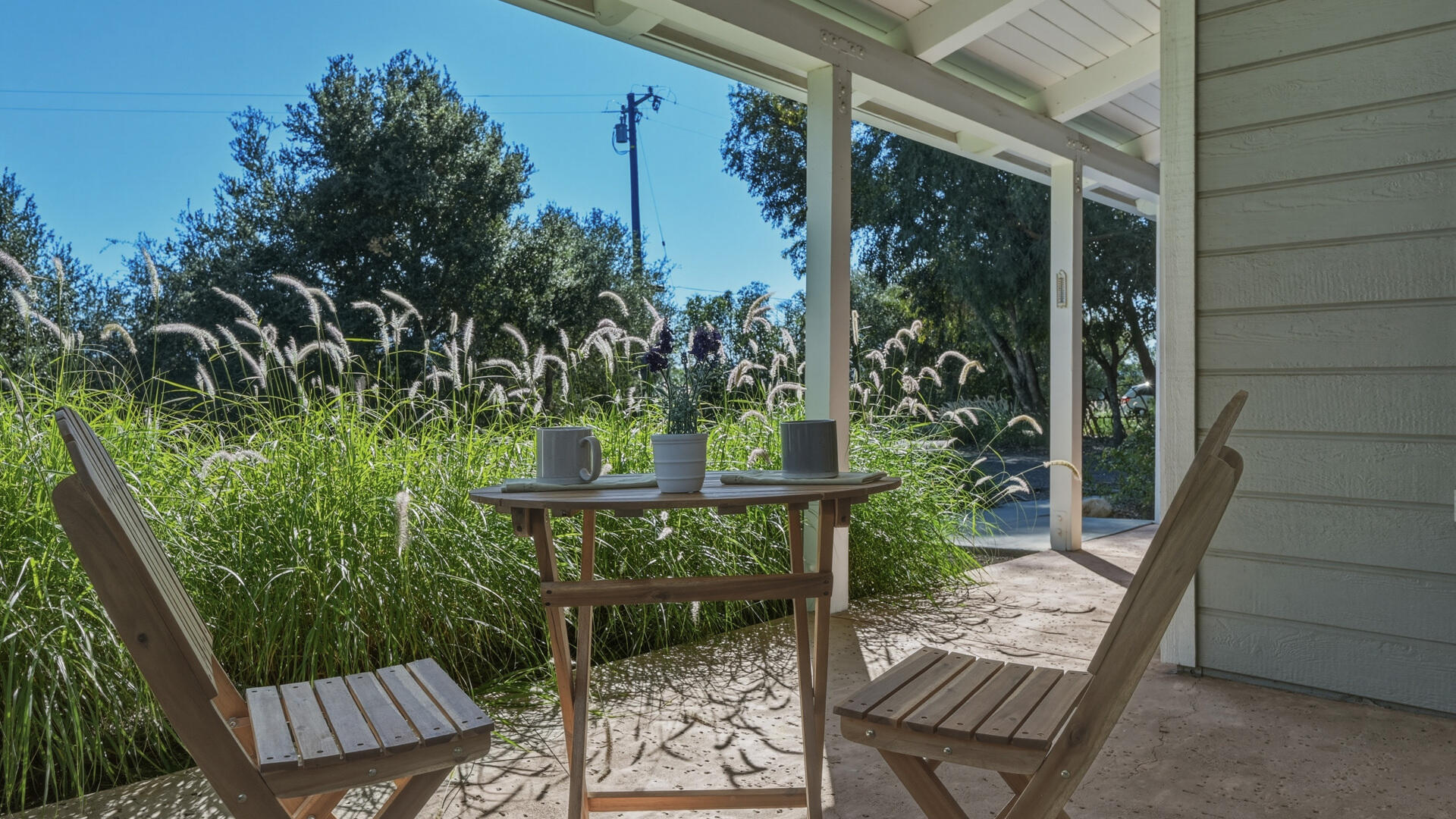 1642 Alamo Pintado Road Solvang, CA 93463 - Photo 69 of 85 a view of balcony with wooden floor and outdoor seating