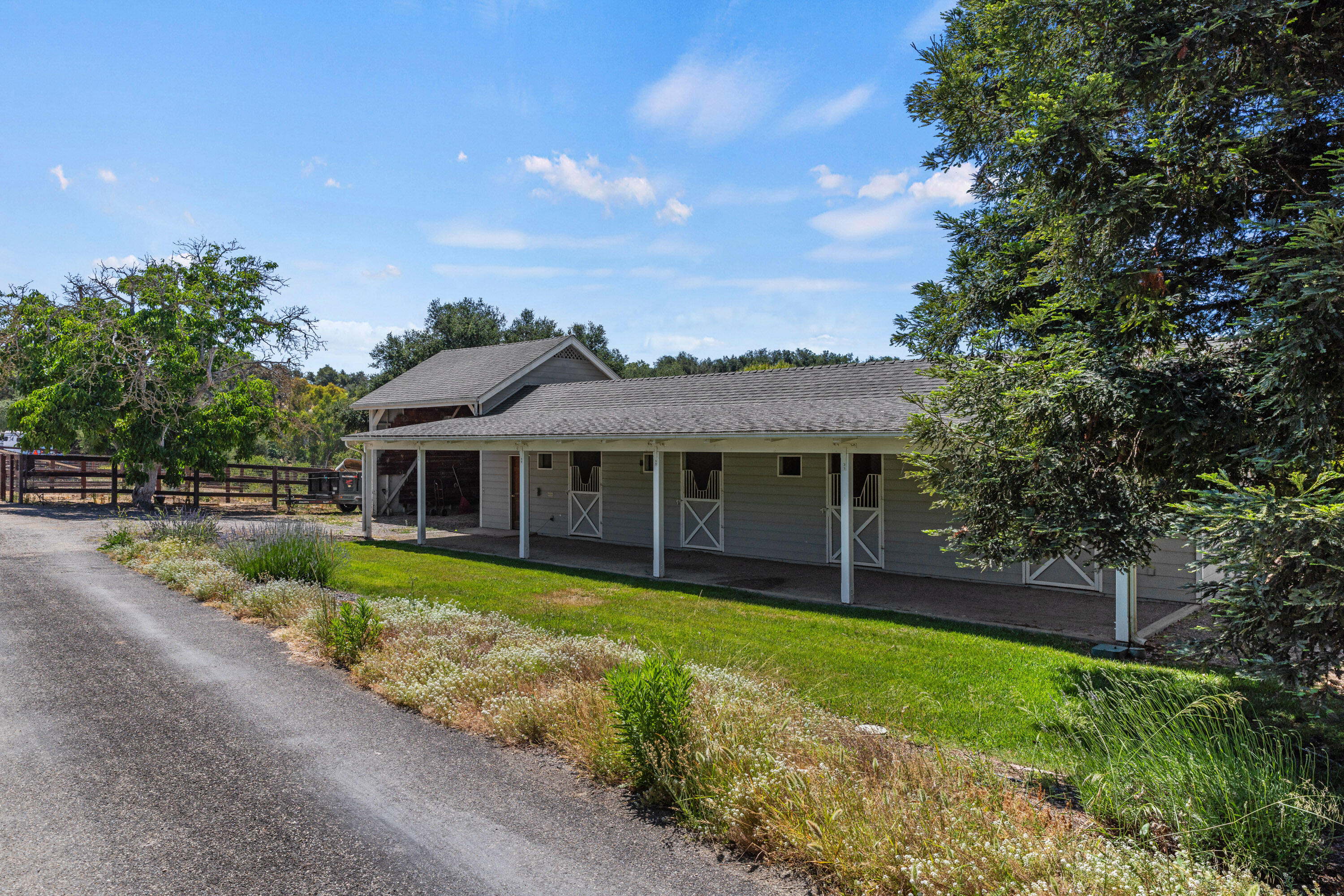 1642 Alamo Pintado Road Solvang, CA 93463 - Photo 70 of 85 a view of a house with yard and tree s