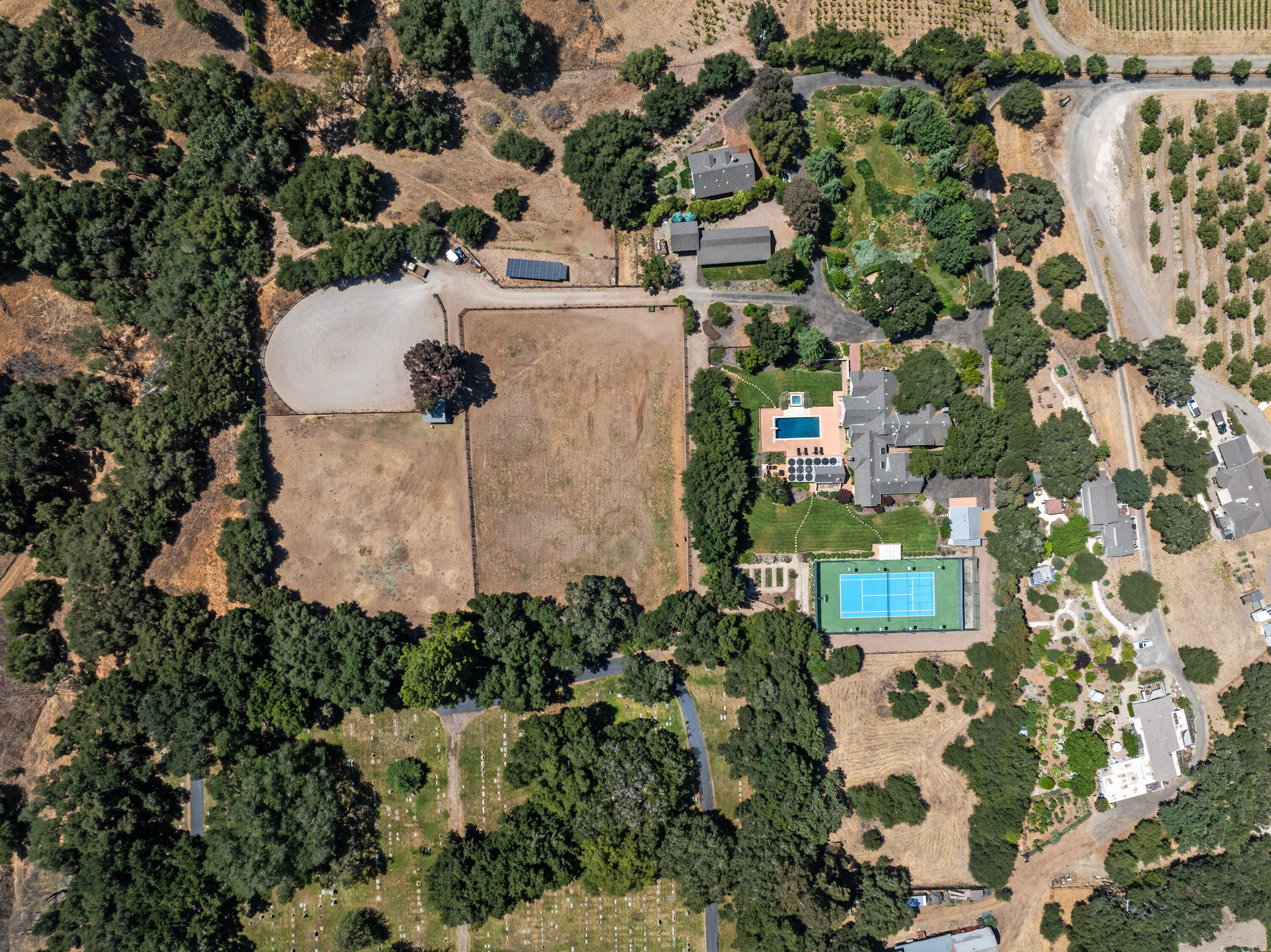 1642 Alamo Pintado Road Solvang, CA 93463 - Photo 84 of 85 an aerial view of a house with a yard and garden