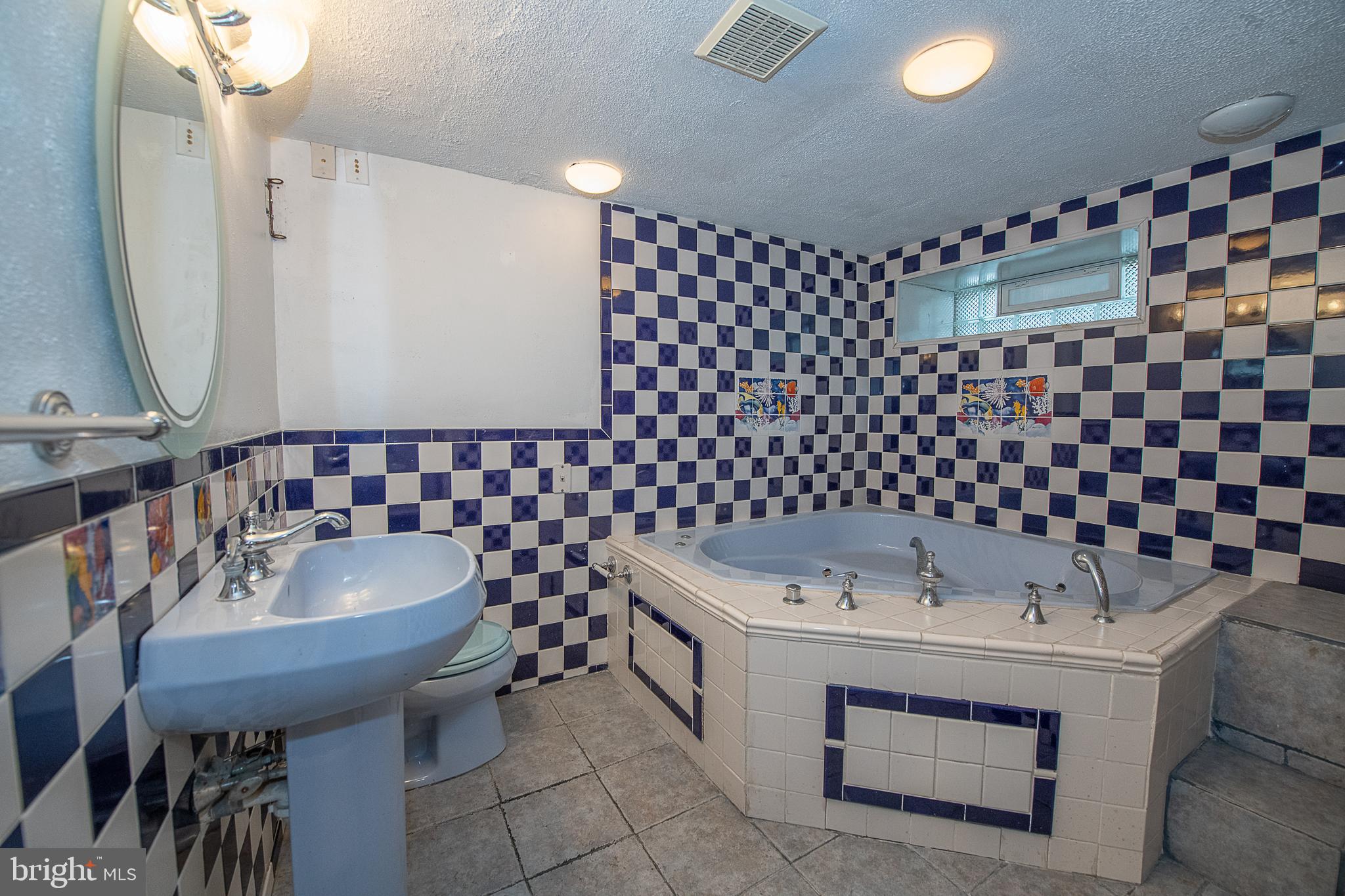 5607 Gainor Road Philadelphia, PA 19131 - Photo 27 of 29 Full Bathroom with Jacuzzi Tub
