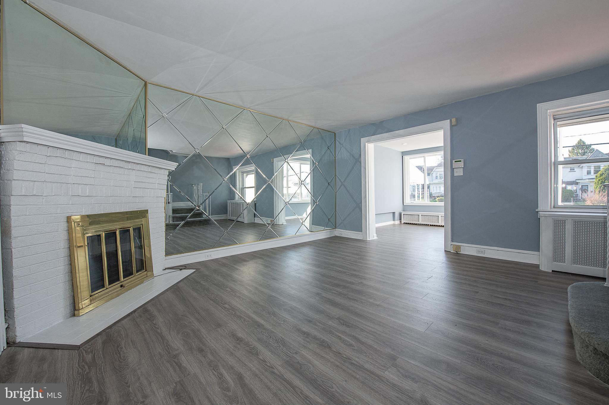 5607 Gainor Road Philadelphia, PA 19131 - Photo 5 of 29 Living Room with Fireplace