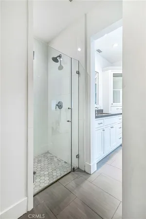 a view of a bathroom with mirror