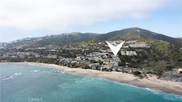an aerial view of residential house and mountain view