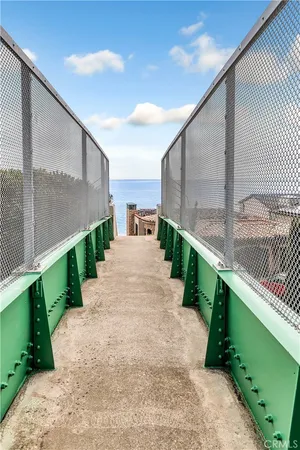 a view of a pathway with a terrace