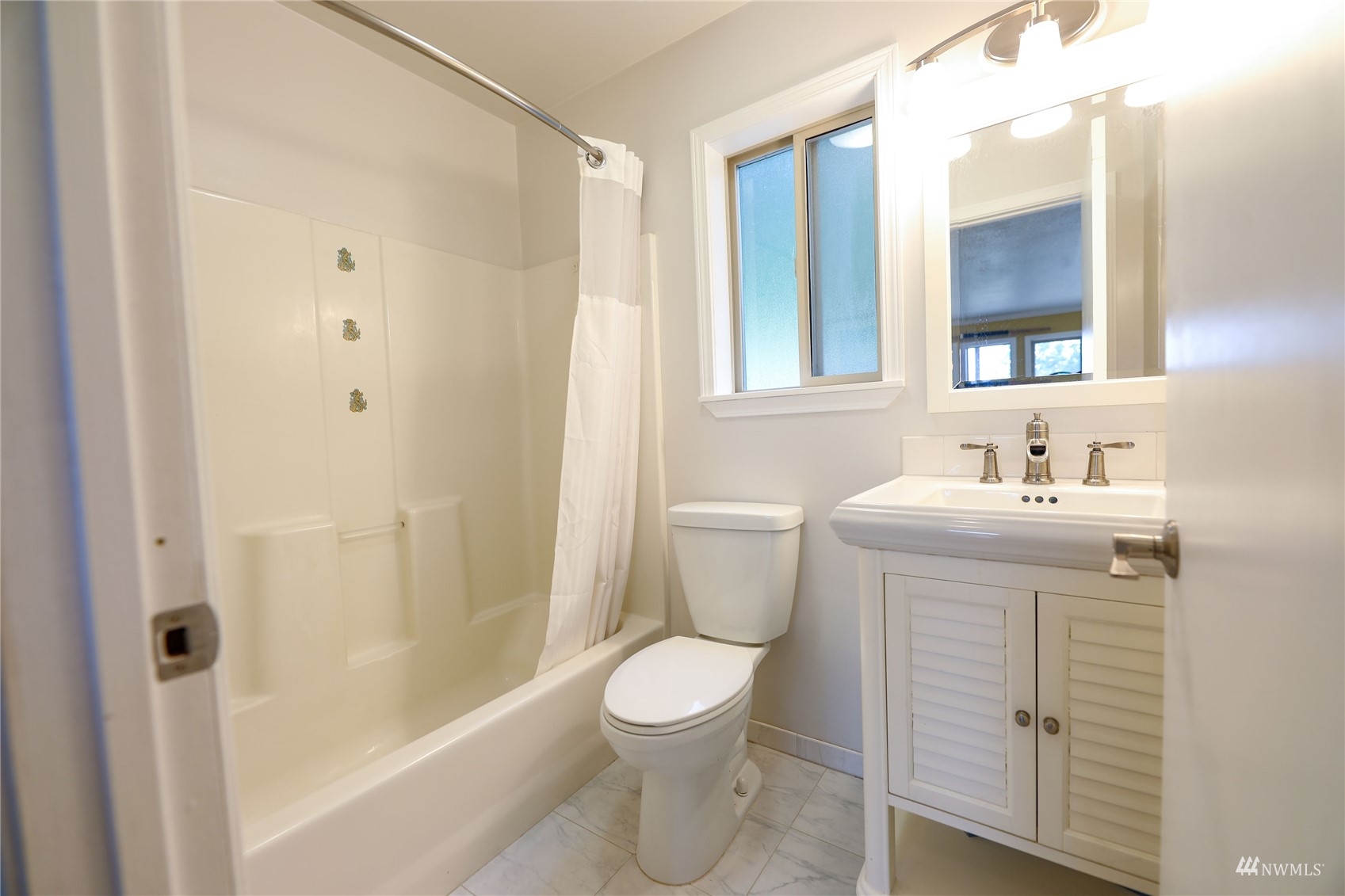 208 Reed Bay Road Decatur Island, WA 98221 - Photo 18 of 33 a bathroom with a sink a toilet and shower
