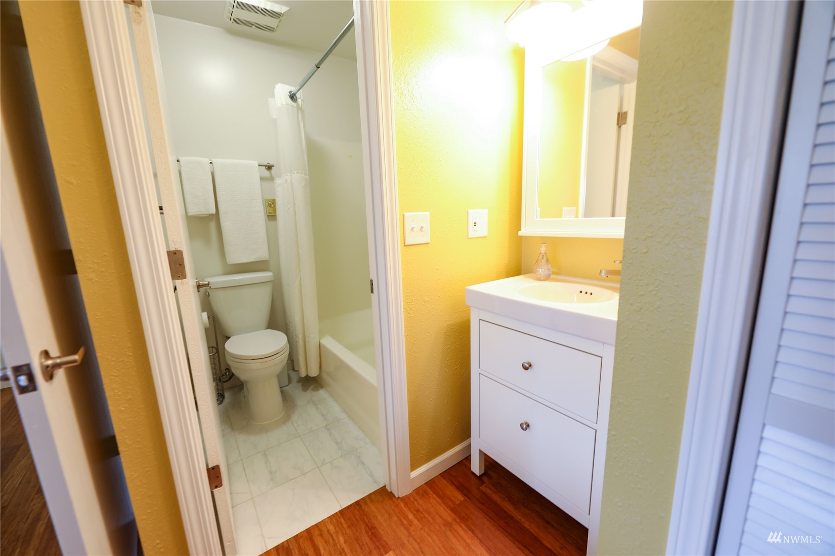 208 Reed Bay Road Decatur Island, WA 98221 - Photo 24 of 33 a bathroom with a granite countertop sink toilet and shower