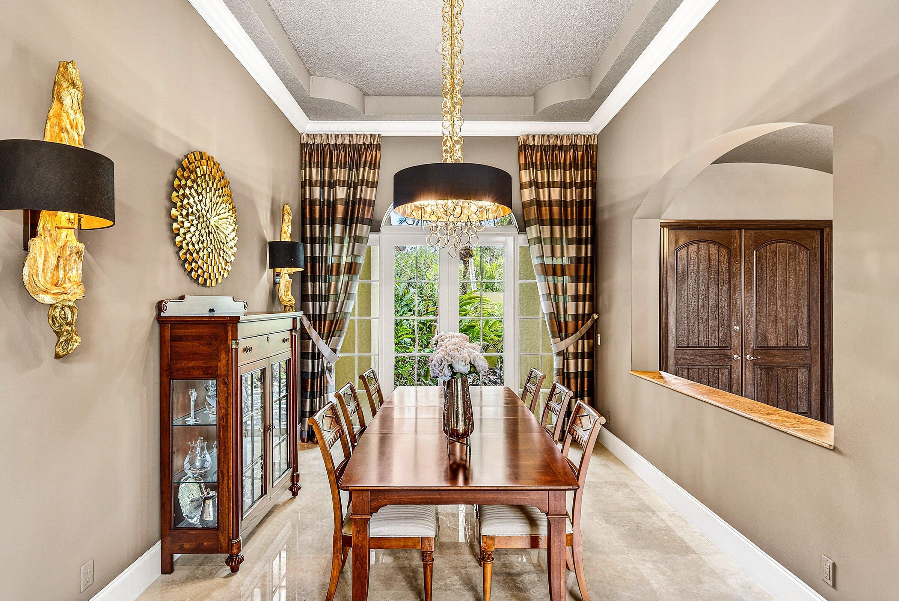 6445 Montesito Street Boca Raton, FL 33496 - Photo 16 of 86 a view of a dining room with furniture window and outside view