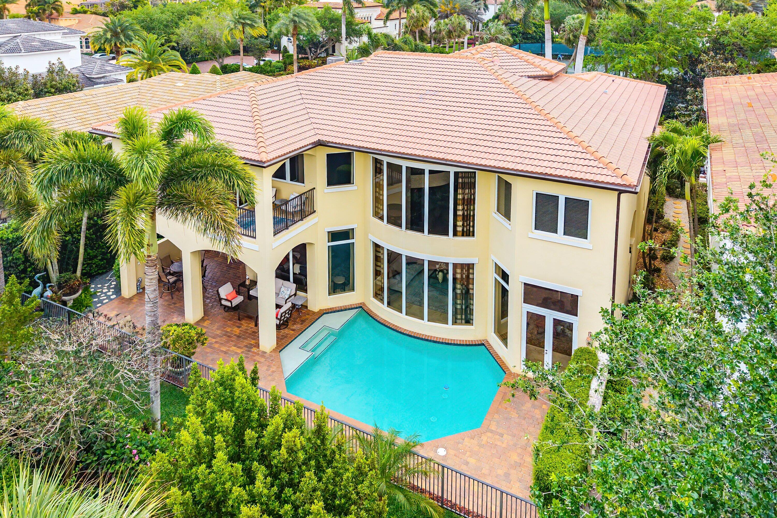 6445 Montesito Street Boca Raton, FL 33496 - Photo 39 of 86 a aerial view of a house with yard and sitting area