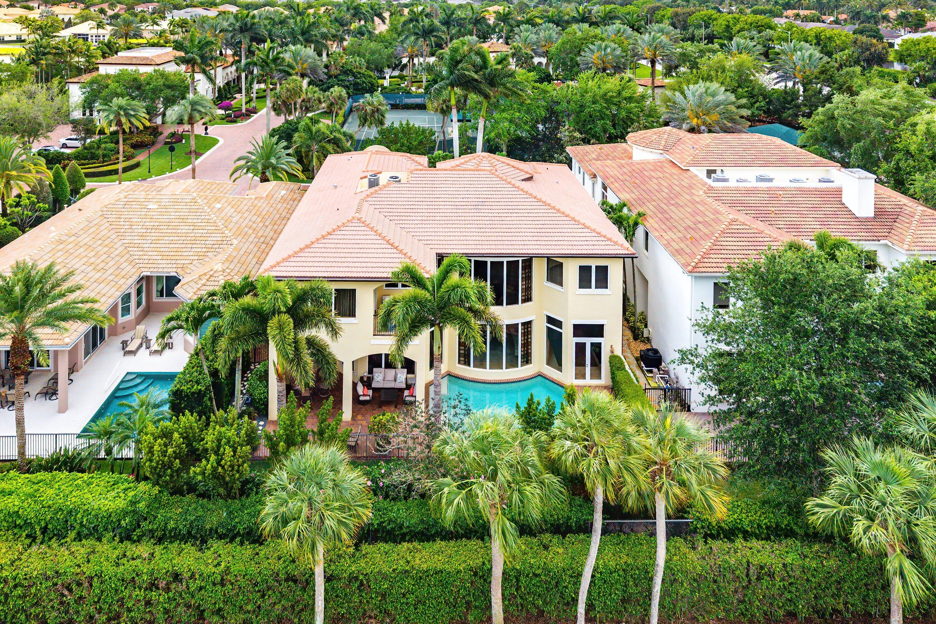6445 Montesito Street Boca Raton, FL 33496 - Photo 40 of 86 an aerial view of a house with yard swimming pool and outdoor seating
