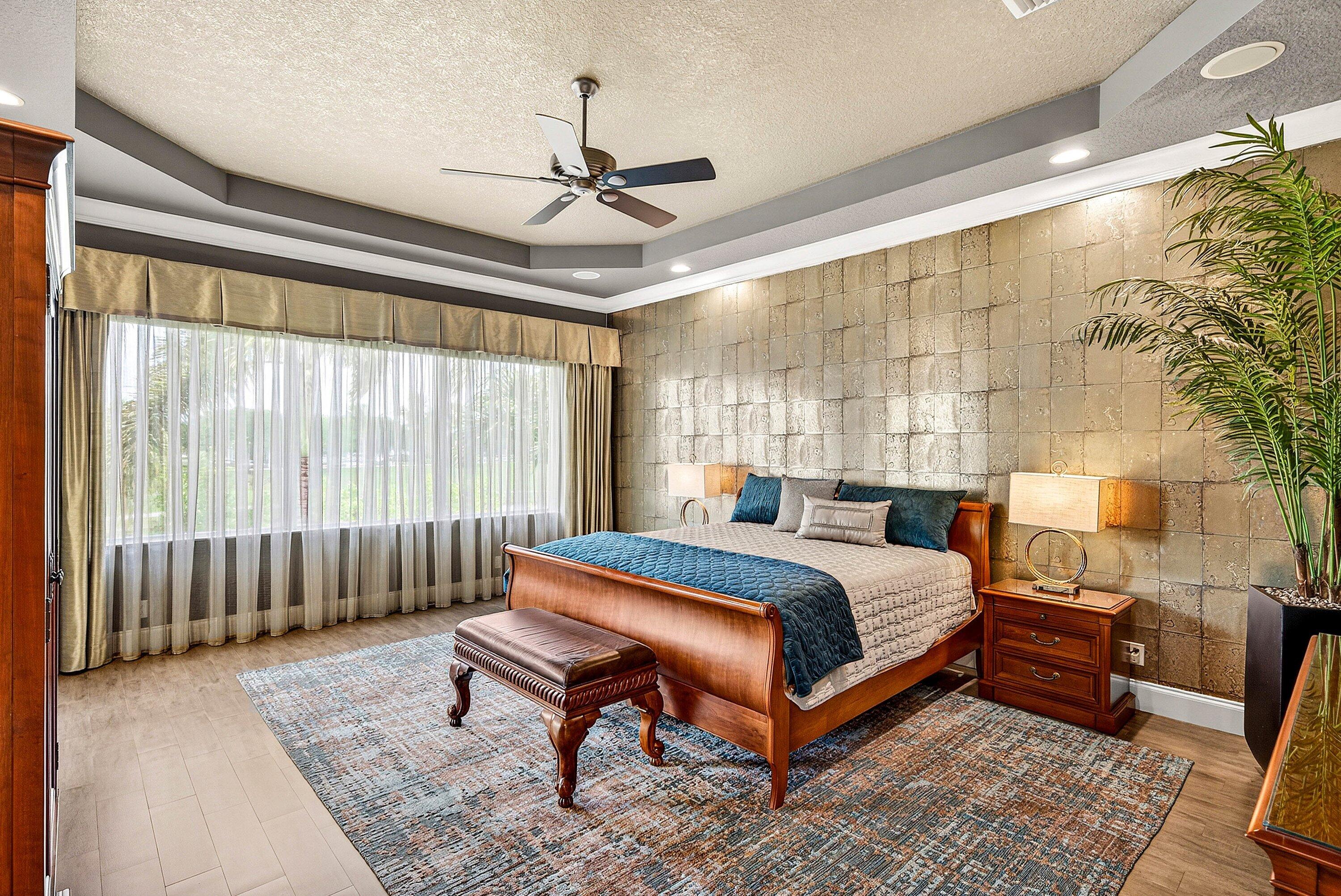 6445 Montesito Street Boca Raton, FL 33496 - Photo 45 of 86 a bed room with a bed and a chandelier