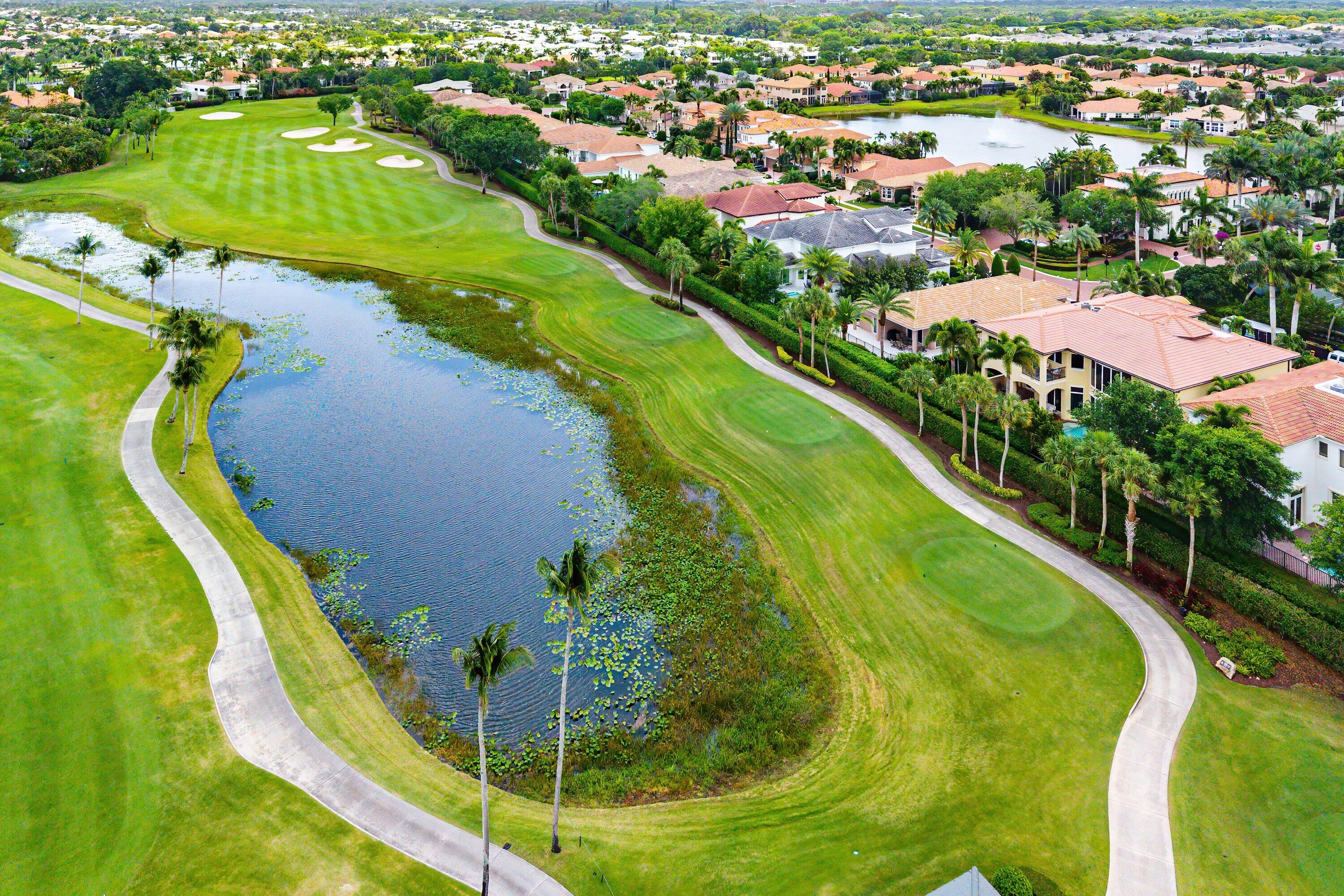 6445 Montesito Street Boca Raton, FL 33496 - Photo 69 of 86 an aerial view of a residential houses with outdoor space and swimming pool