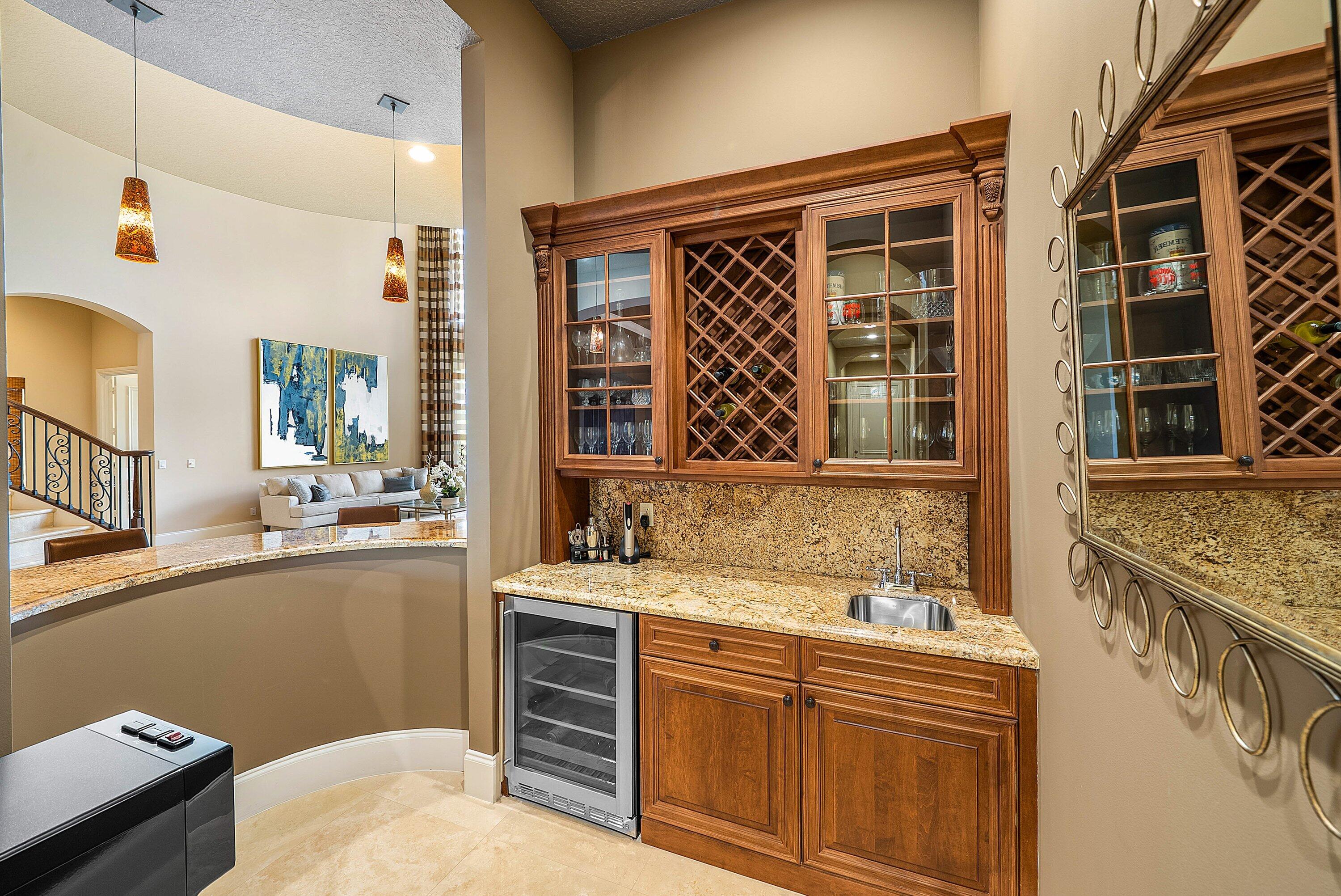 6445 Montesito Street Boca Raton, FL 33496 - Photo 84 of 86 a bathroom with a sink and a mirror