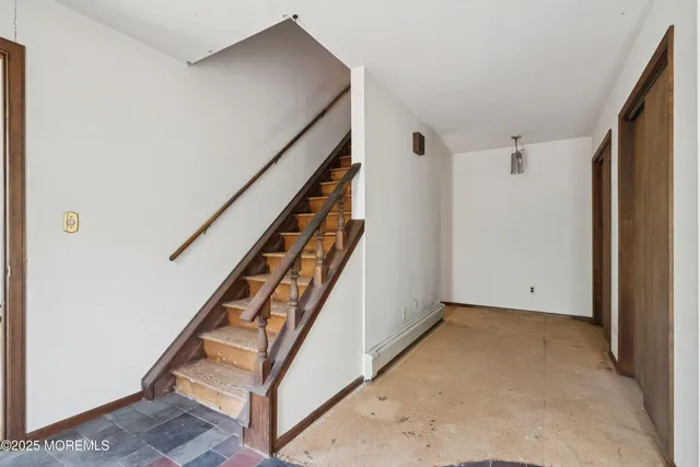 a view of an entryway with staircase
