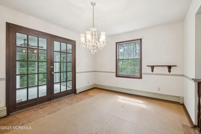 a view of livingroom with furniture and chandelier