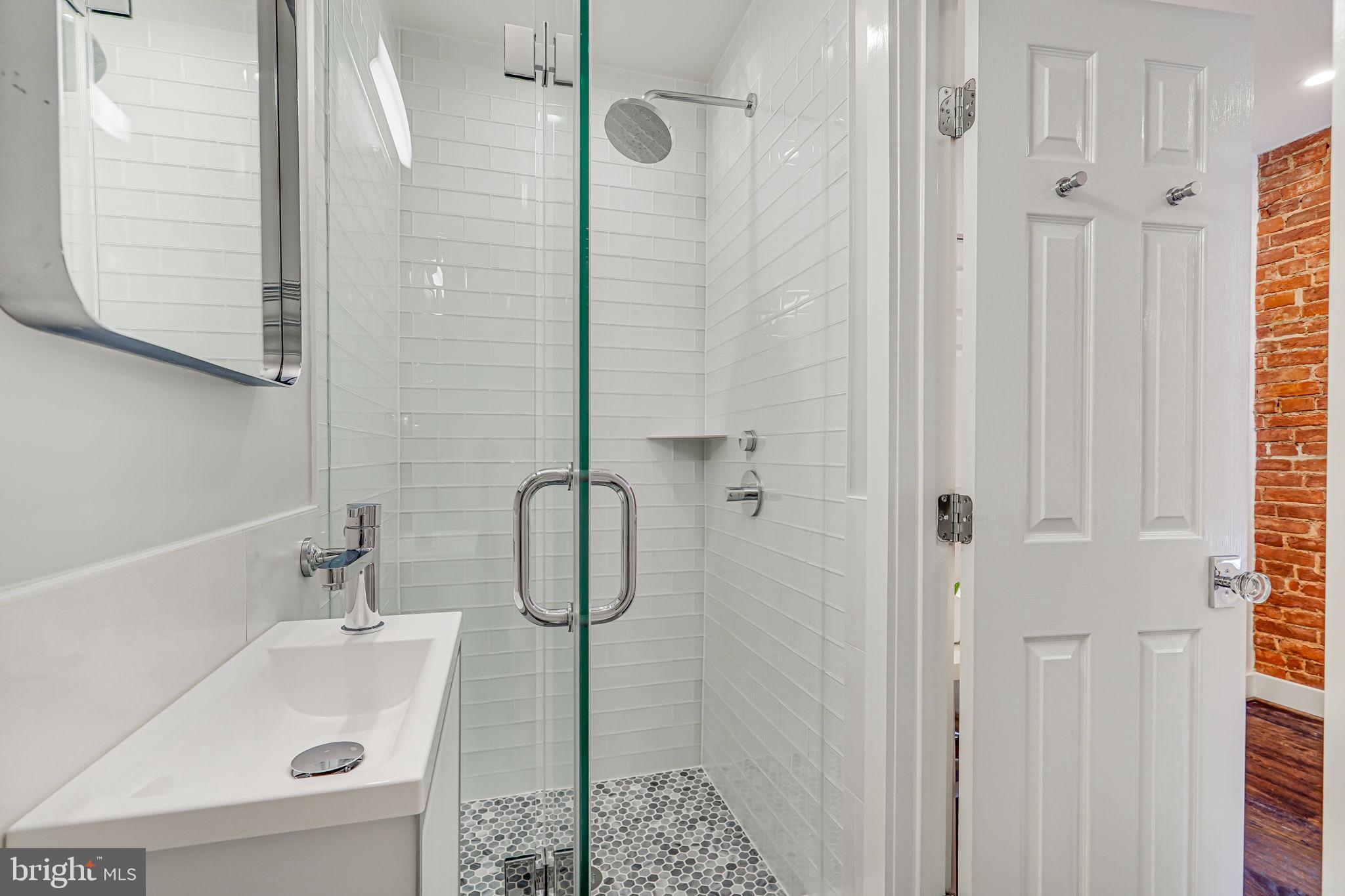 1608 Corcoran Street Northwest Washington, DC 20009 - Photo 16 of 28 Modern & Bright hallway full bathroom