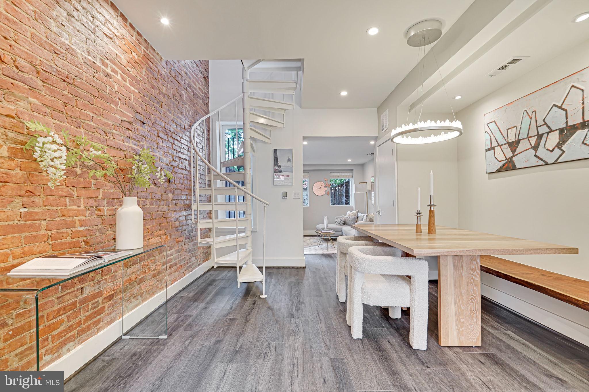 1608 Corcoran Street Northwest Washington, DC 20009 - Photo 4 of 28 Separate dining area w/ built-in reclaimed seating